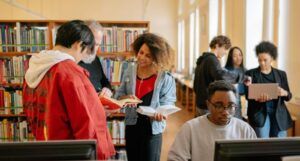 a diverse group of people at the library