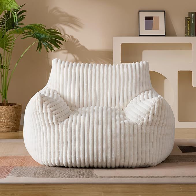 beige giant bean bag chair with armrests