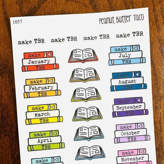 image of a sheet of rainbow colored book stickers that say "make tbr"