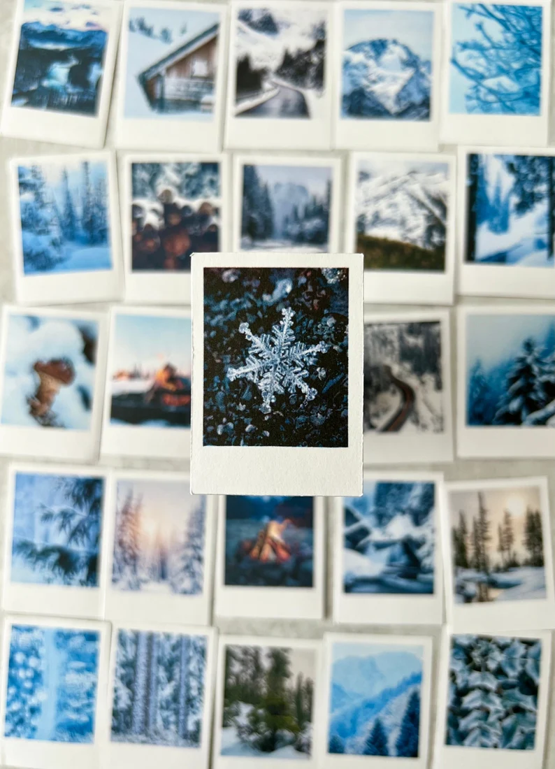 Polaroid style stickers with winter scenes