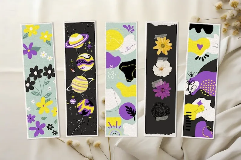 a set of bookmarks in designs using nonbinary pride flag colors