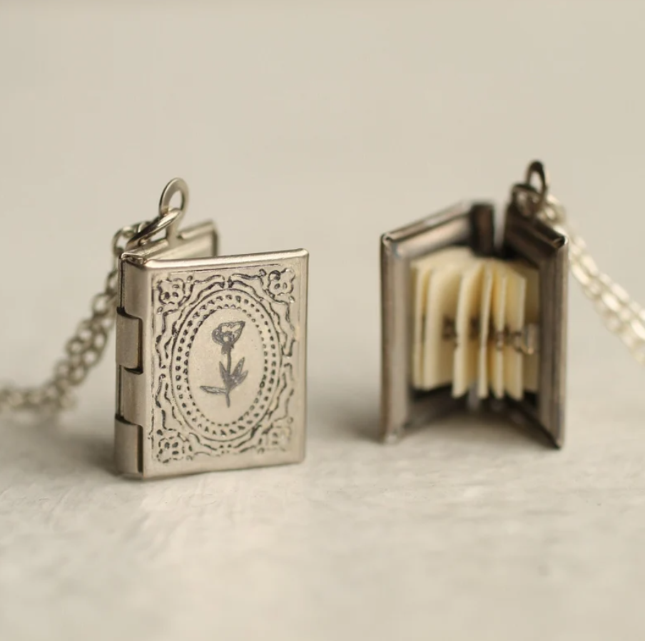 A bookish locket on a chain