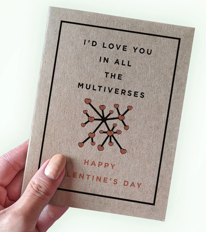 Card that says "I'd love you in all the multiverses" with an illustration of linked hearts