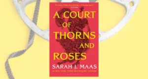 image of acotar cover on top of a yellow background with a film reel