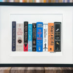 a framed print of a custom bookshelf illustration