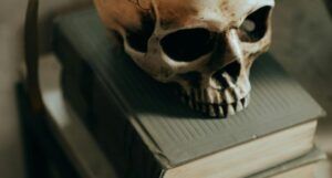 skull on a stack of books