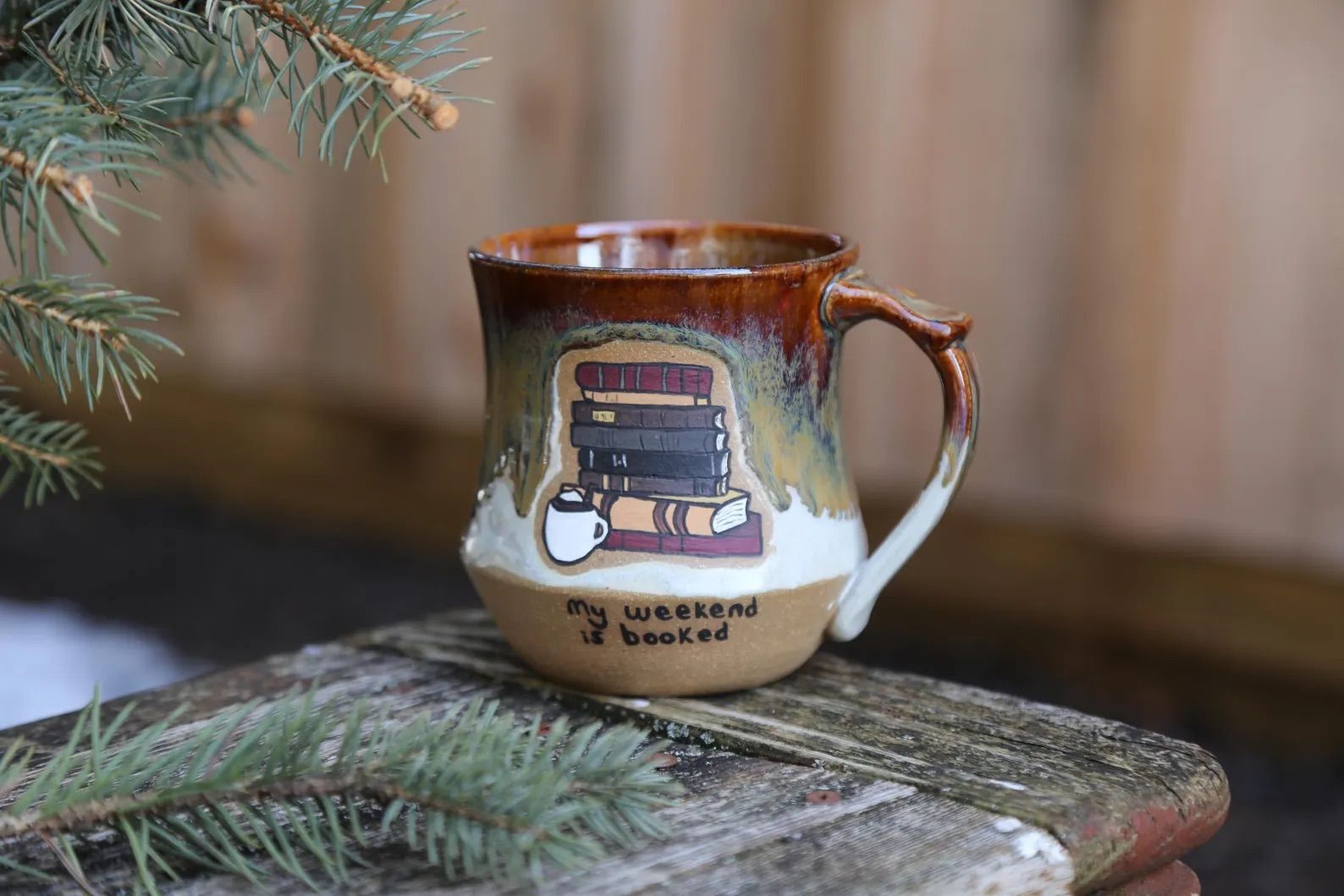 14oz Hand Painted Ceramic Rainbow Coffee Mug on a countertop.