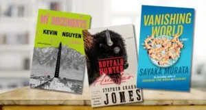 3 covers of books against a table background
