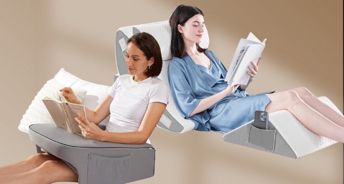 two women reading using support pillows