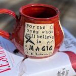 a mug with a VE Schwab quotation