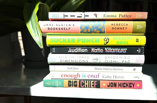 Stack of books mentioned on the First Edition Podcast