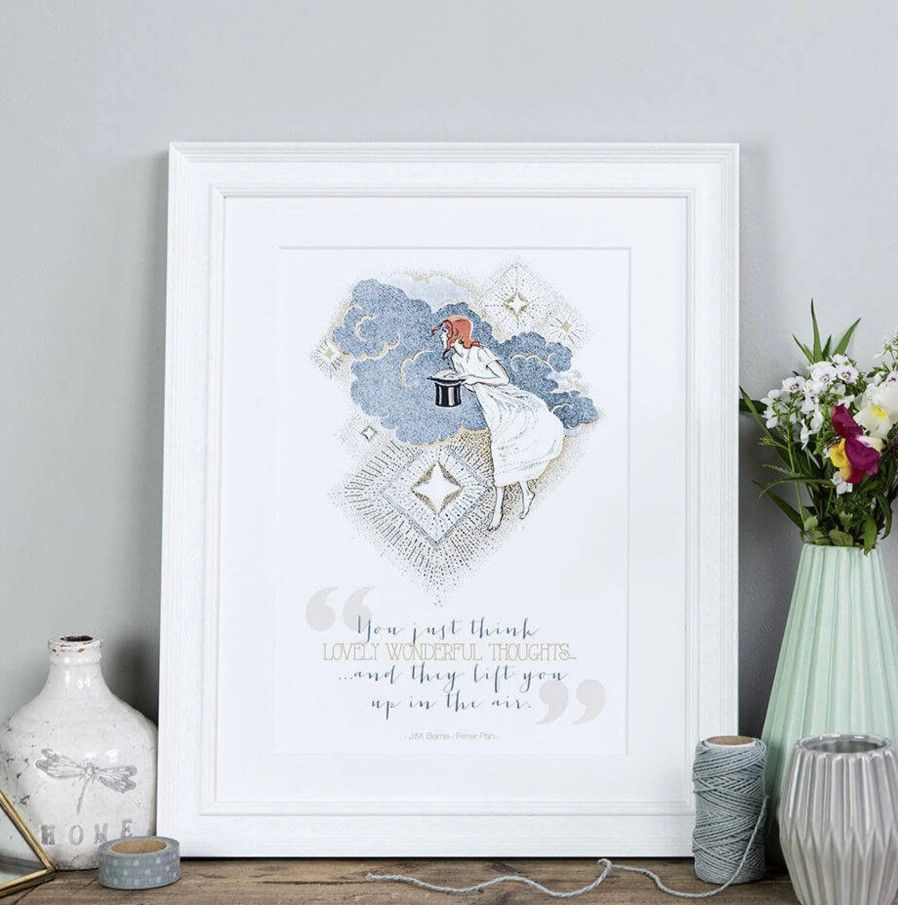A print that reads "You just think lovely wonderful thoughts. . .and they lift you up in the air."