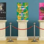 queer book covers on pedestals