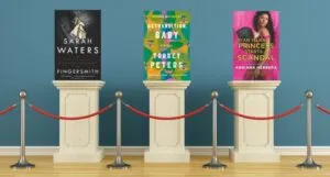queer book covers on pedestals