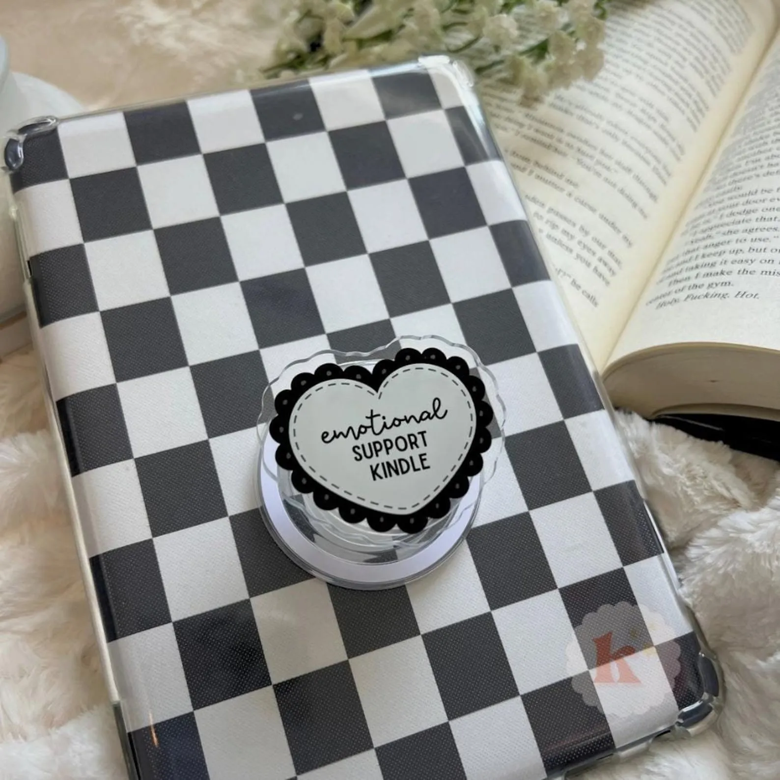 emotional support kindle pop socket on a checkered Kindle case
