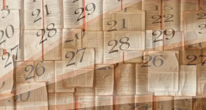 open books with semi-transparent overlay of calendar pages