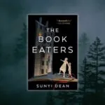 the book eaters cover against backdrop of misty dark forest