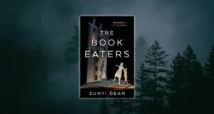 the book eaters cover against backdrop of misty dark forest