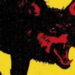 cropped cover of Mongrels by Stephen Graham Jones showing a growling wolf-like creature