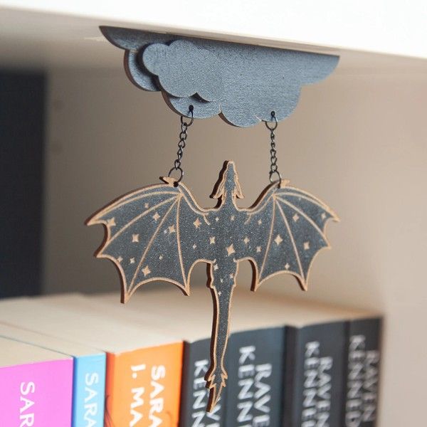 celestial bookshelf dragon charm
