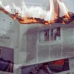 newspaper on fire