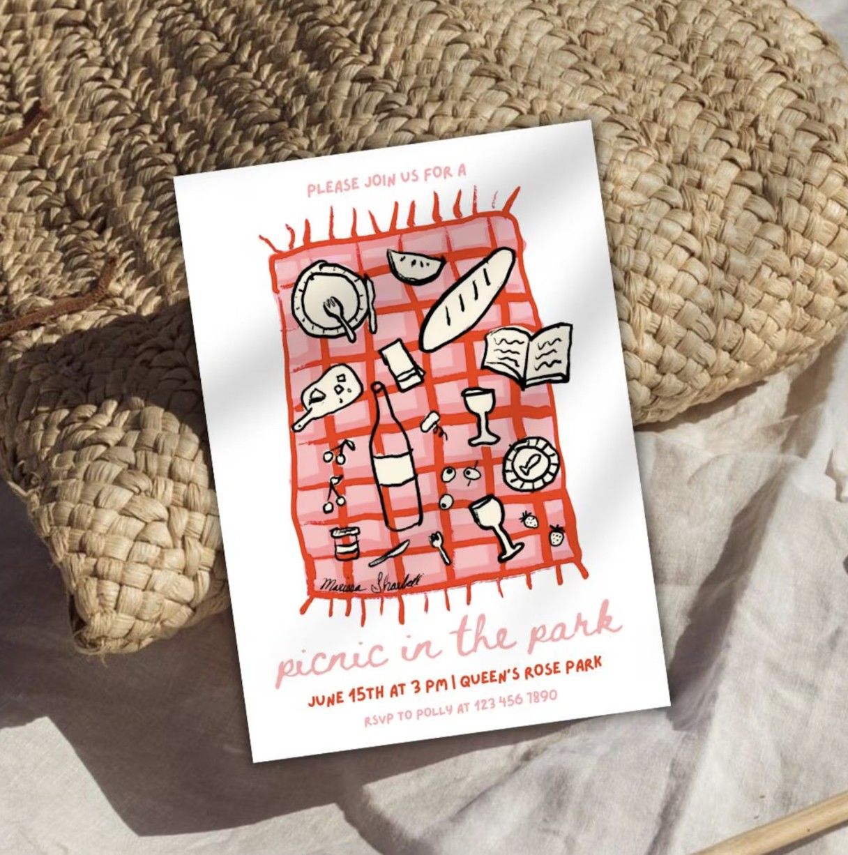 La imagen de una invitación a una fiesta de picnic con comida, vino y dibujos de libros en la manta roja a cuadros