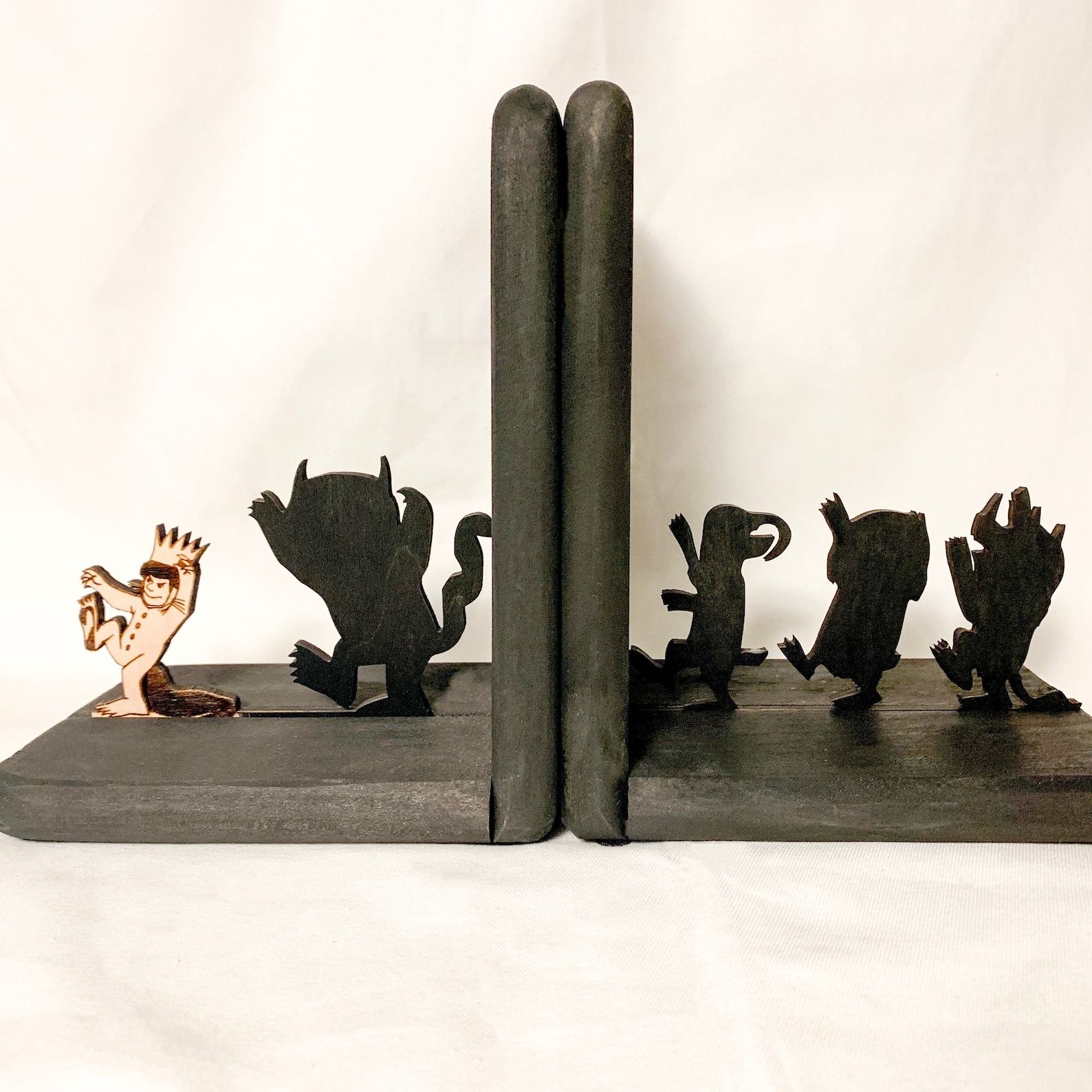 wooden bookends with Where the Wild Things Are characters