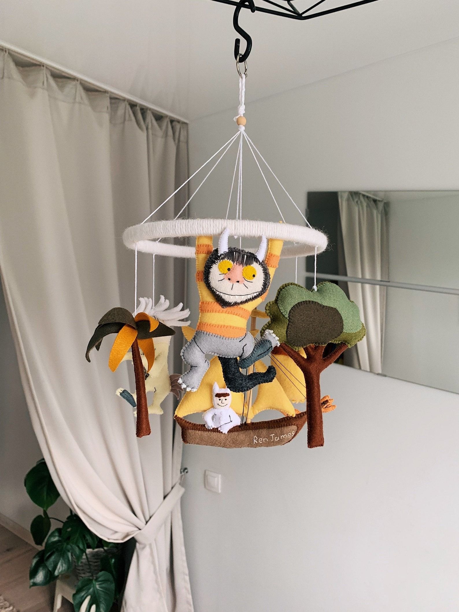 a mobile of stuffed Where the Wild Things Are characters