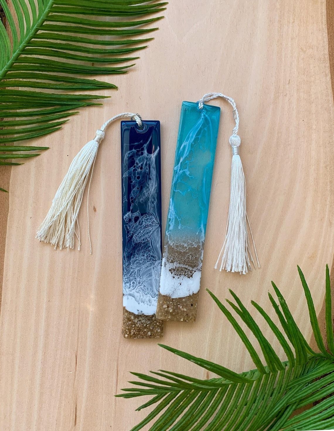 Two bookmarks made to look like shoreline with ocean and sand