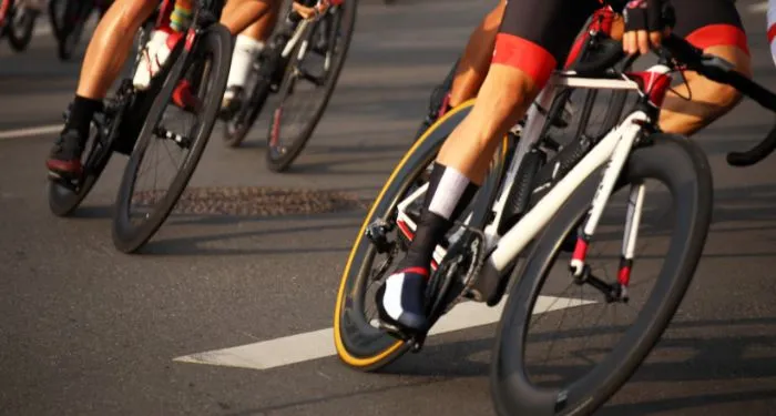several cyclists on asphalt