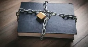 image of a book locked in chains