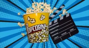 image of a popcorn bucket and clapboard on top of a comics background