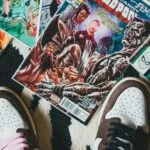 Image of a pair of shoes with comics surrounding them