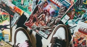 Image of a pair of shoes with comics surrounding them