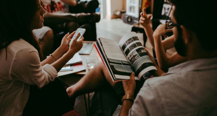 people reading in a semi circle