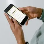 a phone displaying the Read Harder check-in survey
