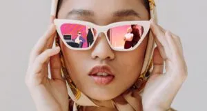 a photo of someone with their sunglasses reflecting spy romance covers