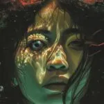 cropped cover of They Bloom at Night by Trang Thanh Tran showing a young Asian women underwater surrounded by red algae