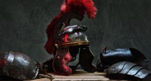 armor of ancient greek soldier on a wood table against dark gray background