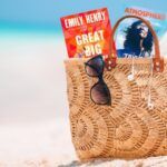 a beach bag with Great Big Beautiful Life and Atmosphere sticking out