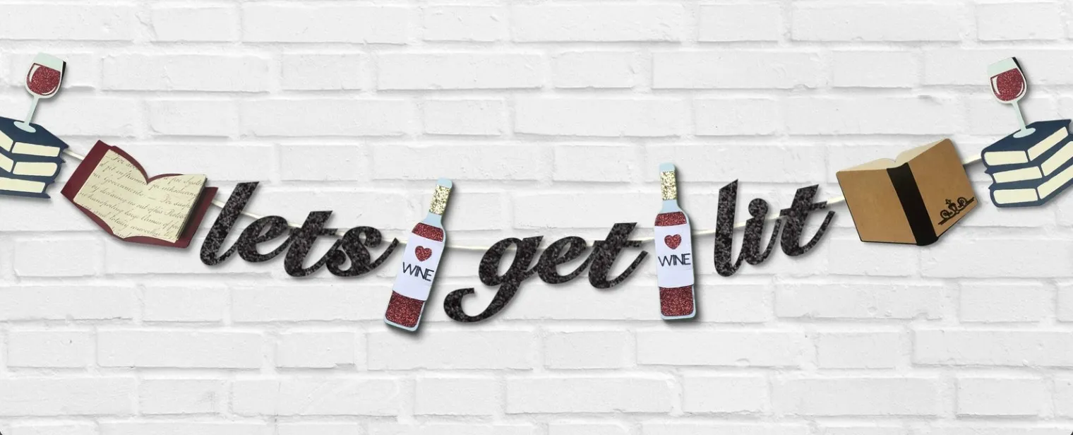 Image of cutout paper garland that says "let's get lit" with wine bottle and books interspersed