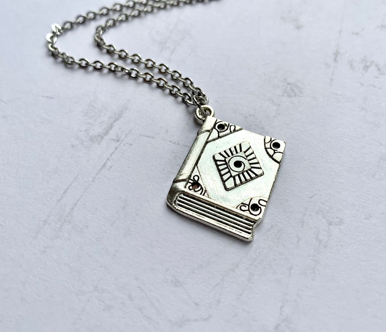silver diary or book necklace
