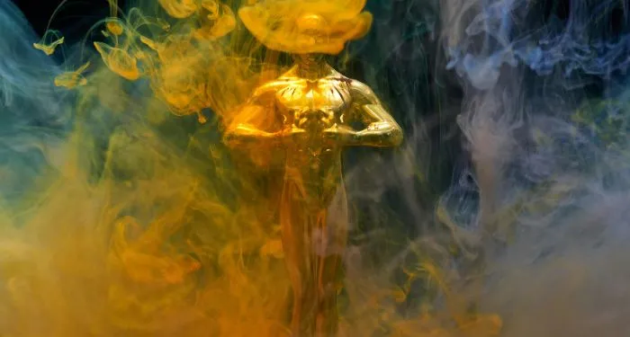 award shrouded in colorful smoke
