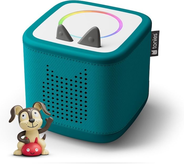 teal Toniebox 2 player next to a small dog figurine