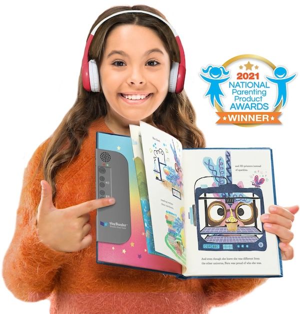a young girl wearing headphone and holding an open book with an audio device anchored to one side of the book