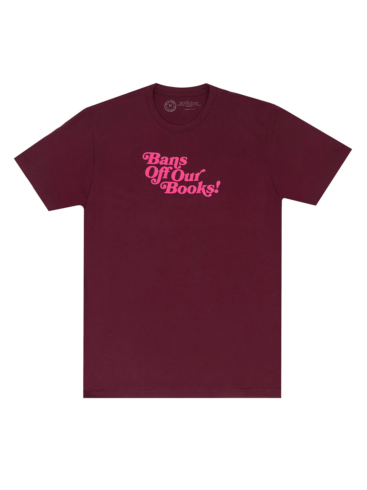 Image of a maroon shirt that says "bans off our books" in bright pink. 