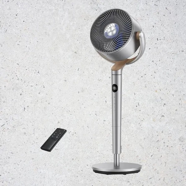 silver standing fan and black remote