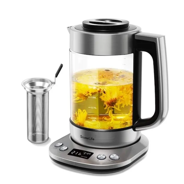 glass electric kettle on top of a silver base with temperature and timer controls