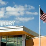 Image of a library against a blue sky