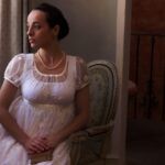 a woman in regency dress